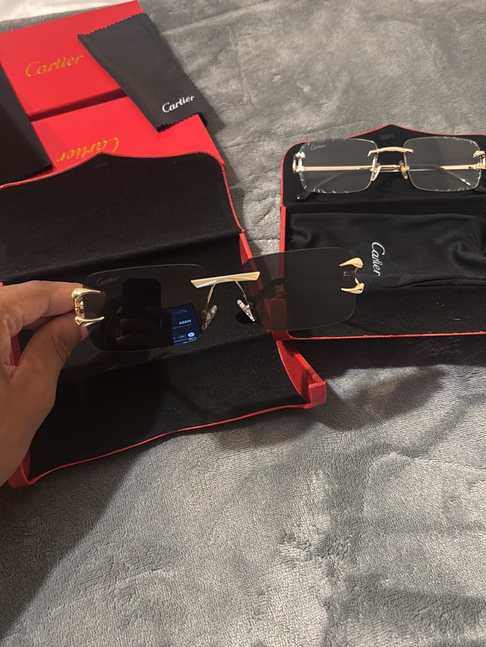 Cartier Men's Black Lens Rimless Sunglasses with Gold Hardware